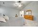 Cozy bedroom with a large dresser, ceiling fan, and plush bed for a restful retreat at 3195 Hadden Hall Blvd, Fort Mill, SC 29715