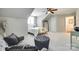 Bedroom featuring neutral color scheme, fan, and comfortable seating area at 3195 Hadden Hall Blvd, Fort Mill, SC 29715
