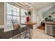 Cozy kitchen nook with breakfast table and a large window offering plenty of natural light at 3195 Hadden Hall Blvd, Fort Mill, SC 29715