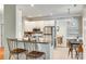 Kitchen with breakfast bar, stainless steel appliances, and views into the breakfast nook at 3195 Hadden Hall Blvd, Fort Mill, SC 29715
