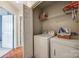 Laundry room with washer, dryer, wire rack and storage baskets at 3195 Hadden Hall Blvd, Fort Mill, SC 29715