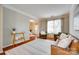 Open-concept living room with hardwood floors, large windows, and natural light at 3195 Hadden Hall Blvd, Fort Mill, SC 29715