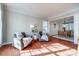 Cozy living room area with hardwood floors and open flow to dining room at 3195 Hadden Hall Blvd, Fort Mill, SC 29715