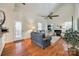 Spacious living room with hardwood floors, fireplace, vaulted ceiling, and backyard access at 3195 Hadden Hall Blvd, Fort Mill, SC 29715