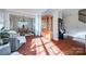 Bright living room with hardwood floors, a china cabinet, and an open floor plan at 3195 Hadden Hall Blvd, Fort Mill, SC 29715