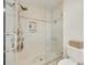 Modern shower features glass doors, sleek fixtures, tiled walls and shower niche at 3195 Hadden Hall Blvd, Fort Mill, SC 29715