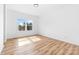 Bright bedroom with large windows and hardwood floors provides ample natural light at 501 Ed Wilson Rd, Bessemer City, NC 28016