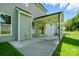 View of the back porch which features a concrete floor and a covered ceiling at 5112 Heathland Dr # 75, Charlotte, NC 28215