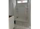 Clean, modern bathroom featuring a stand-up shower with built-in shelving and white fixtures at 5115 Heathland Dr # 47, Charlotte, NC 28215
