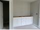 Bathroom features new vanity with white cabinets at 5115 Heathland Dr # 47, Charlotte, NC 28215
