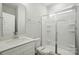 Bathroom featuring a single vanity with shower stall featuring a glass door at 5115 Heathland Dr # 47, Charlotte, NC 28215