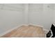 Walk-in closet with carpeted floor and wire shelving for ample storage at 5115 Heathland Dr # 47, Charlotte, NC 28215