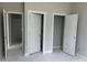 Bright hallway with multiple doorways, offering easy access to different areas of the home at 5115 Heathland Dr # 47, Charlotte, NC 28215