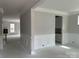 Bright living room featuring white trim, molding, and wainscoting details, offering a classic, elegant touch at 5115 Heathland Dr # 47, Charlotte, NC 28215