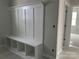 Functional mudroom with a built-in bench and storage cubbies, perfect for organizing entry essentials at 5115 Heathland Dr # 47, Charlotte, NC 28215