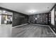 Finished basement with luxury vinyl plank flooring and a large entertainment room at 8905 Valleymoon Ln, Charlotte, NC 28214