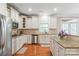 Modern kitchen features stainless appliances, granite countertops, and ample cabinet space at 8905 Valleymoon Ln, Charlotte, NC 28214