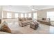 Comfortable loft area with plush sofas and soft carpeting, perfect for relaxation or entertaining guests at 8905 Valleymoon Ln, Charlotte, NC 28214