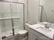 Bathroom with shower, toilet, and white vanity at 102 Obadiah Ct, Troutman, NC 28115