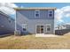 Backyard featuring a patio and view of surrounding neighborhood at 103 Obadiah Ct, Mooresville, NC 28115