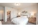 Main bedroom with a queen-size bed and en-suite bathroom at 107 Obadiah Ct, Mooresville, NC 28115