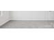 This carpeted bedroom includes a door at 107 Obadiah Ct, Troutman, NC 28115