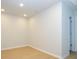 Spacious, minimalist bedroom with hardwood floors, neutral walls and ample natural light at 149 Halite Ln, Waxhaw, NC 28173