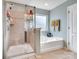 Bathroom featuring a shower and a bathtub at 2741 Smethwick Ln, Gastonia, NC 28056