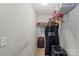 Walk-in closet with shelving, hanging racks, luggage, and plenty of storage space at 8007 April Ln, Matthews, NC 28104