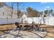 Outdoor fire pit with Adirondack chairs provides a relaxing gathering space at 8007 April Ln, Matthews, NC 28104