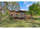 Backyard featuring a wooden deck and mature trees around the property at 841 12Th Nw Ave, Hickory, NC 28601
