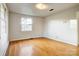 Light-filled bedroom with hardwood flooring and a large window, perfect for relaxation at 841 12Th Nw Ave, Hickory, NC 28601