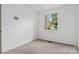 Bedroom with neutral carpeting, and a window providing natural light at 841 12Th Nw Ave, Hickory, NC 28601