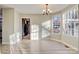 Bright dining room featuring laminate wood floors and a large window for natural light at 841 12Th Nw Ave, Hickory, NC 28601