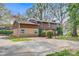 Lovely two-story home featuring brick and wood siding, lush landscaping, and a spacious driveway at 841 12Th Nw Ave, Hickory, NC 28601
