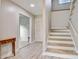Inviting foyer featuring wood floors, staircase and neutral paint, creating a warm welcome at 841 12Th Nw Ave, Hickory, NC 28601
