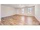 Bright and airy living room with hardwood floors and neutral walls at 1310 S Branch Dr, Edgemoor, SC 29712