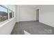 Bright bedroom with plush carpeting and plenty of natural light at 15008 Brownleigh Ln # 29, Huntersville, NC 28078