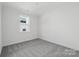 Cozy bedroom featuring natural light and neutral carpeting to complement any design style at 15008 Brownleigh Ln # 29, Huntersville, NC 28078