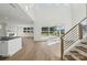 Spacious living room featuring hardwood floors, fireplace, and sliding glass doors at 15008 Brownleigh Ln # 29, Huntersville, NC 28078