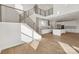 Open concept living space featuring stairs, wood floors and a modern kitchen at 15008 Brownleigh Ln # 29, Huntersville, NC 28078