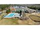 Aerial view of community pool, tennis courts, and playground at 17712 Yarwill Ct, Charlotte, NC 28278