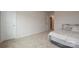 This cozy bedroom features neutral carpet and walls with a queen sized bed and ensuite at 318 Kingsford Dr, Stanley, NC 28164