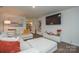 Bright and open living room space with a large TV and stylish decorations at 318 Kingsford Dr, Stanley, NC 28164