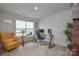 Bright office with a double desk, comfortable seating, and large window offering a productive workspace at 318 Kingsford Dr, Stanley, NC 28164