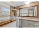 Retro bathroom with bathtub, custom vanity, and large mirror at 4501 Taylorsville Hwy, Statesville, NC 28625