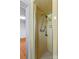 Shower stall with yellow tiling and updated shower head fixtures, offering a clean and functional space at 4501 Taylorsville Hwy, Statesville, NC 28625