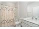 Cozy bathroom features a shower and tub combo and a vanity with a sink at 654 Saddlebred Ln, Locust, NC 28097