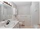 Clean bathroom with updated vanity and tiled shower/tub at 105 Kiser Ln, Statesville, NC 28677