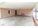 Covered brick patio with concrete flooring and bench at 105 Kiser Ln, Statesville, NC 28677